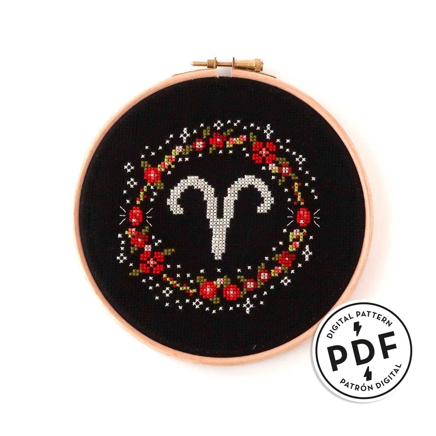 Patrón de punto de cruz en PDF con el signo de Aries rodeado de flores en tonos de rojo. Signo del zodíaco de punto de cruz moderno y redondo para enmarcar en aro de bordar.
