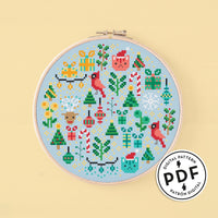 Esquema de punto de cruz en pdf "Mini Christmas Garden". Bordado redondo con elementos navideños como renos, luces de colores, bolas para el árbol, árboles de navidad, estrellas de nieve, bastones de caramelo, etc. Punto de cruz de navidad moderno y original.